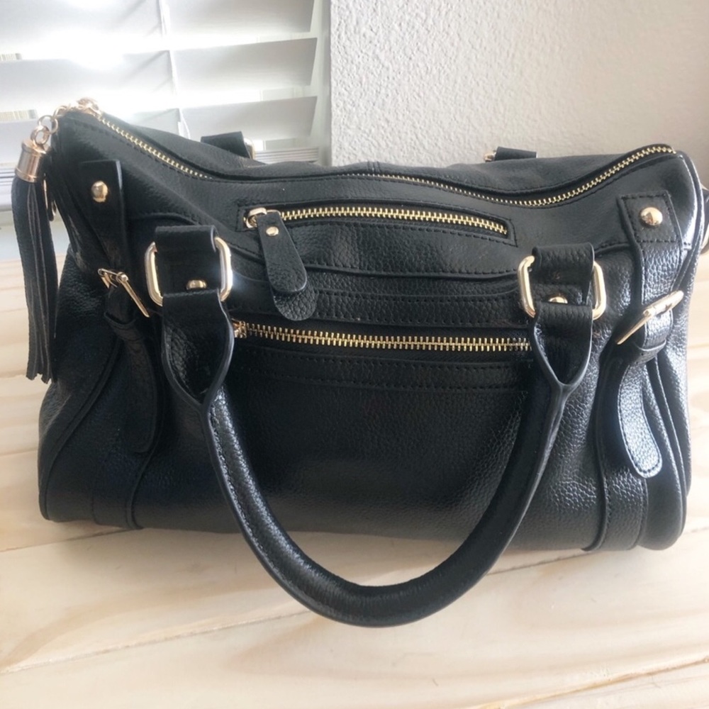 Erica Anenberg venteux leather Black bag. AR,8/13